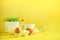 Healthy baking ingredients - butter, sugar, flour, eggs, oil, spoon, brush, whisk, milk over yellow background. Banner. Bakery