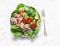 Healthy balanced diet  food - canned tuna, tomatoes, cucumbers, lettuce, red onion, olive oil salad for appetizer, lunch, tapas