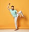 Healthy bearded man balancing on one leg portrait