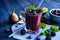 Healthy blackberry smoothie with figs, blueberry and lime
