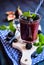 Healthy blackberry smoothie with figs, blueberry and lime