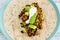 Healthy blant-based recipes, beans rice and avocado open wrap with vegan aioli
