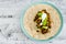Healthy blant-based recipes, beans rice and avocado open wrap with vegan aioli