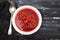 Healthy borsh beet soup in white bowl