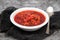 Healthy borsh beet soup in white bowl