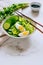 Healthy bowl, cucumber salad with eggs and coriander