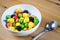 Healthy bowl with fruits and vegetables on table home spoon closeup happy enegry life breakfast