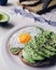 healthy breakfast with avocado and Delicious wholewheat toast. sliced avocado on toast bread with egg. Mexican cuisine