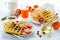 Healthy breakfast. Belgian waffles with nuts and blood oranges
