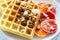 Healthy breakfast. Belgian waffles with nuts and sicilian oranges