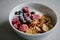 Healthy breakfast with berries, cereals and natural yogurt