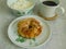 a healthy breakfast with black coffee, homemade cottage cheese and bagel. healthy eating