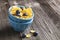 Healthy breakfast. Blue portioned ceramic bowls with corn flakes fresh blueberries