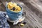 Healthy breakfast. Blue portioned ceramic bowls with corn flakes fresh blueberries