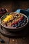Healthy breakfast bowl with granola, yogurt, fresh berries and fruits.