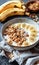 Healthy Breakfast Bowl With Greek Yogurt, Sliced Bananas, and Granola