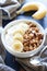 Healthy Breakfast Bowl With Greek Yogurt, Sliced Bananas, and Granola