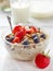 Healthy breakfast, bowl of muesli with milk