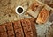 Healthy breakfast with chocolate cake and coffee on a vintage board