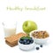 Healthy breakfast - crisp bread, apple, blueberries, milk, muesli