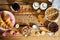 Healthy breakfast with different types of breakfast cereal with honey marmalade croissants and milk