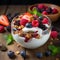 healthy breakfast featuring granola, berries, and yogurt