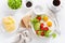 Healthy breakfast flat lay. fried eggs, avocado, tomato, toasts