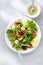 Healthy breakfast Fresh plate salad gray concrete background top view