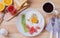 Healthy breakfast with fried egg, toasts and strawberry jam