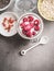 Healthy breakfast in glass jar with yogurt and berries, top view