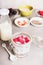 Healthy breakfast glass preparation with : milk, oatmeal , Chia seeds, Goji berries