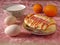 Healthy breakfast with hotdog bread, milk, egg and orange