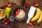 Healthy breakfast ingredients: Oatmeal, honey, fruit, strawberry