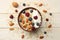 healthy breakfast. oatmeal, blueberries, raspberries and nuts on white wooden table. Top view with copy space