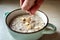 Healthy breakfast oatmeal porridge in bowl. Warm porridge oats, vegan vegetarian weight loss dieting breakfast food.