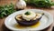 A healthy breakfast plate with amayonnaise, garlic, greens, half a grilled eggplant,olive oil