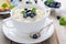 Healthy breakfast: rice pudding with bilberry