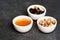 Healthy breakfast snacks for Oatmeal porridge. Dry raisins, honey and nuts