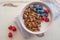 Healthy breakfast super food cereal concept with fresh fruit, granola, yoghurt