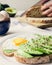 healthy breakfast with tasty avocado and Delicious wholewheat toast. sliced avocado on toast bread with egg. Mexican cuisine