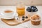 healthy breakfast: tea with cake, honey and fresh blueberry/healthy breakfast: tea with cake, honey and fresh blueberry on a