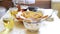 Healthy breakfast with tea, oatmeal and pies on a table