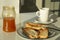 Healthy breakfast with toasted bread, coffee and jam