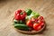 Healthy breakfast with tomatoes, letucce, lime on wooden background, close-up, selective focus, top view.