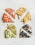 Healthy breakfast wholegrain toasts with cream-cheese, fruit, seeds, nuts