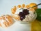 Healthy breakfast with yoghurt, oat flakes and mandarine