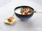 Healthy breakfast yogurt bowl with granola and fig
