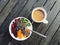 Healthy breakfast: yogurt, plums, kiwi berries, apricots, chia seeds, coffee