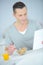 Healthy businessman having breakfast