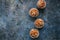 Healthy carrot cake muffins on a blue stone background. Top view